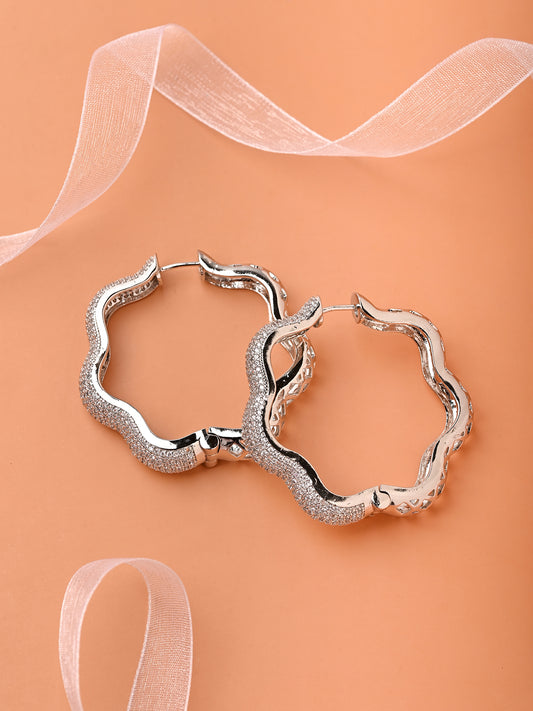 Hoops With A Wave In Rhodium Finish